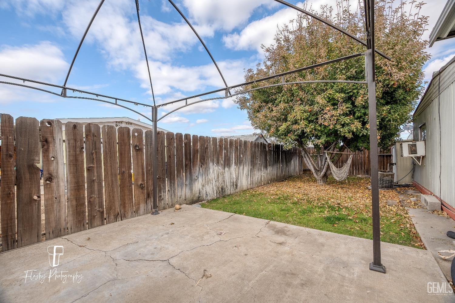 Undisclosed Address Bakersfield, CA 93301 - Photo 26 of 27 a backyard of a house