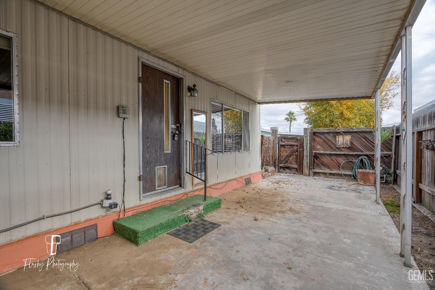 Undisclosed Address Bakersfield, CA 93301 - Photo 5 of 27 a view of backyard with outdoor seating