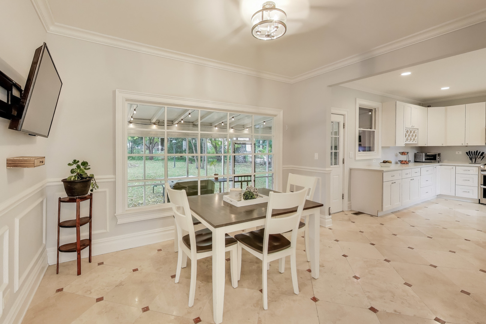 207 Shady Lane Mundelein, IL 60060 - Photo 11 of 28 a view of a dining room with furniture window and outside view
