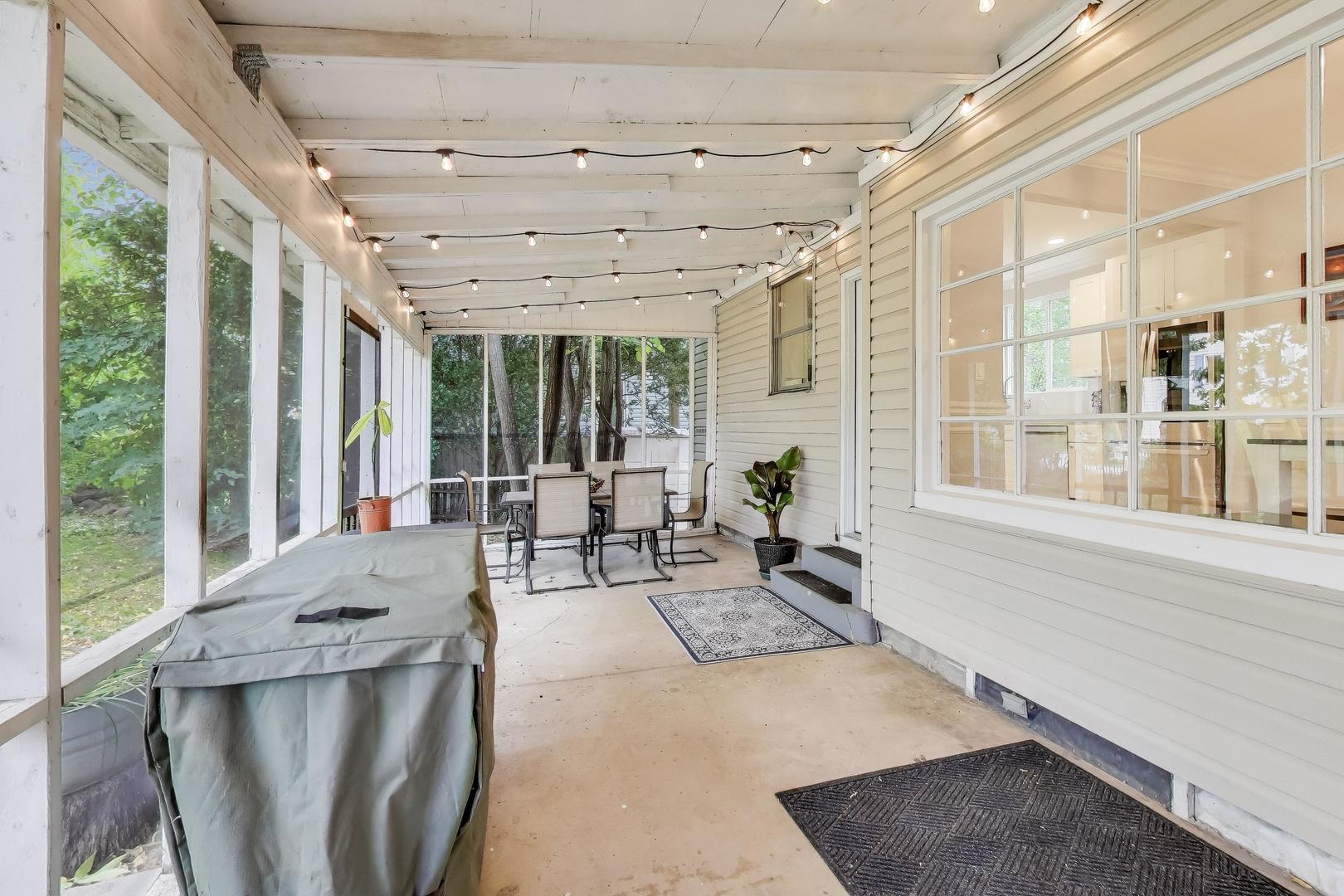 207 Shady Lane Mundelein, IL 60060 - Photo 12 of 28 a living room with furniture and large windows