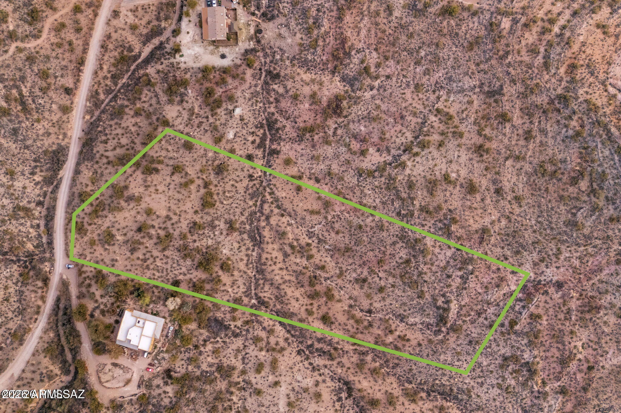 15612 East Colossal Cave Road Vail, AZ 85641 - Photo 3 of 12 a yard with a tree