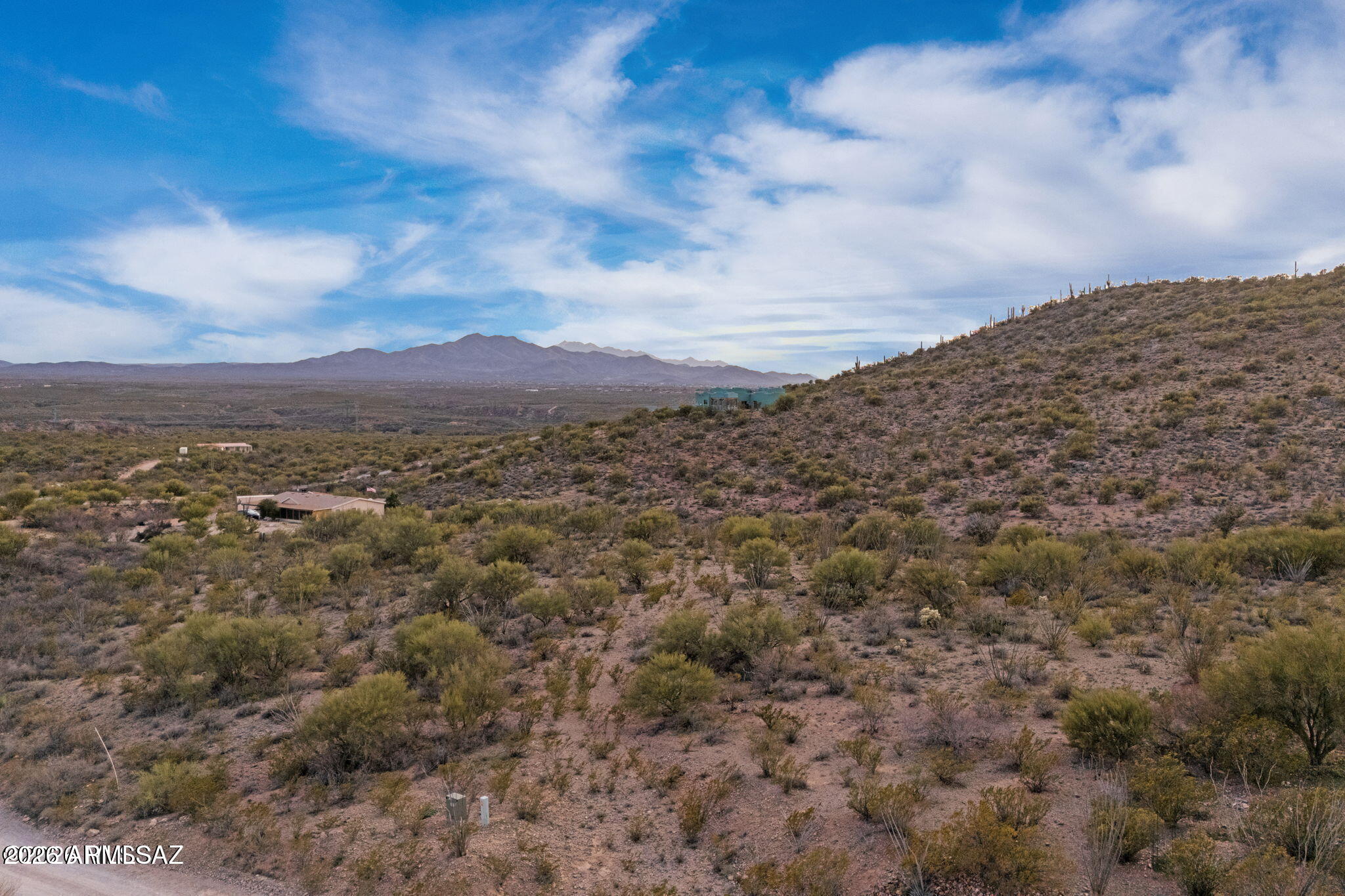 15612 East Colossal Cave Road Vail, AZ 85641 - Photo 7 of 12 a view of a large mountain with mountains in the background