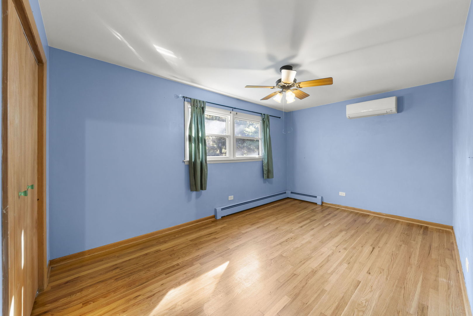 18000 Armitage Court Homewood, IL 60430 - Photo 17 of 23 wooden floor in an empty room with a window