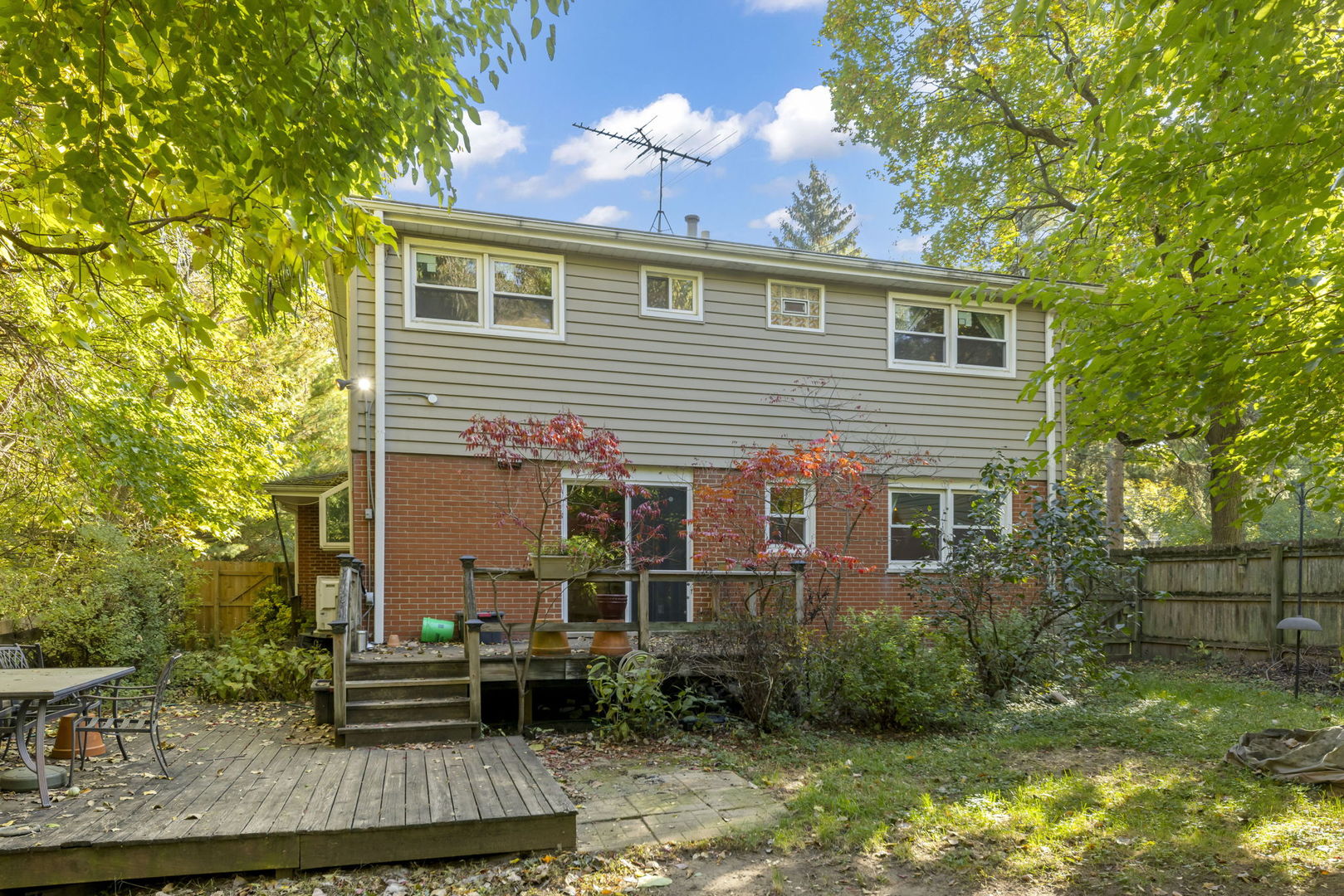 18000 Armitage Court Homewood, IL 60430 - Photo 23 of 23 a view of a house with brick walls plants and large tree