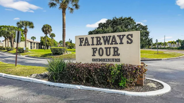 a view of a yard with a swimming pool