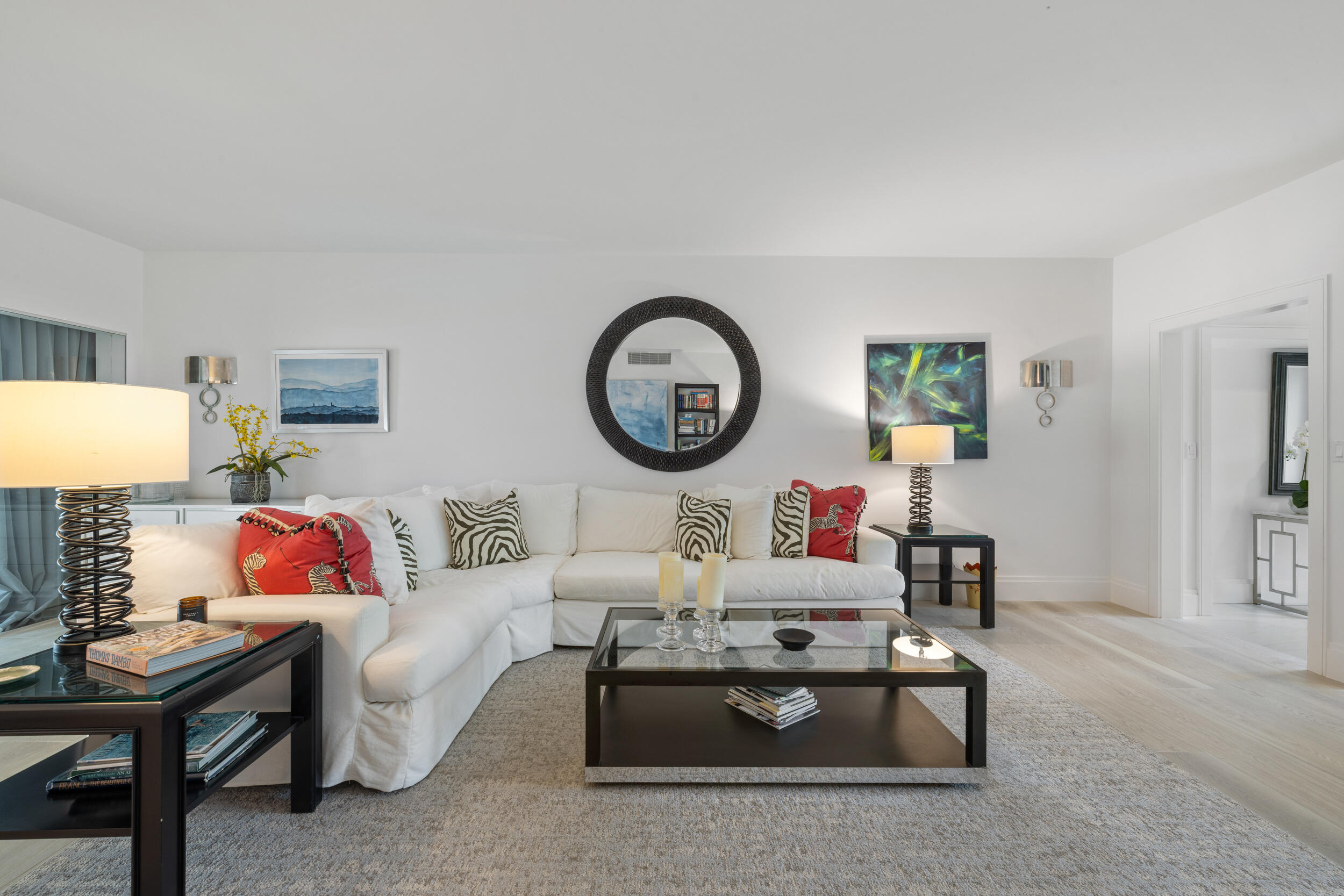 300 South Ocean Boulevard, Unit 3G Palm Beach, FL 33480 - Photo 4 of 25 a living room with furniture a rug and a wall painting