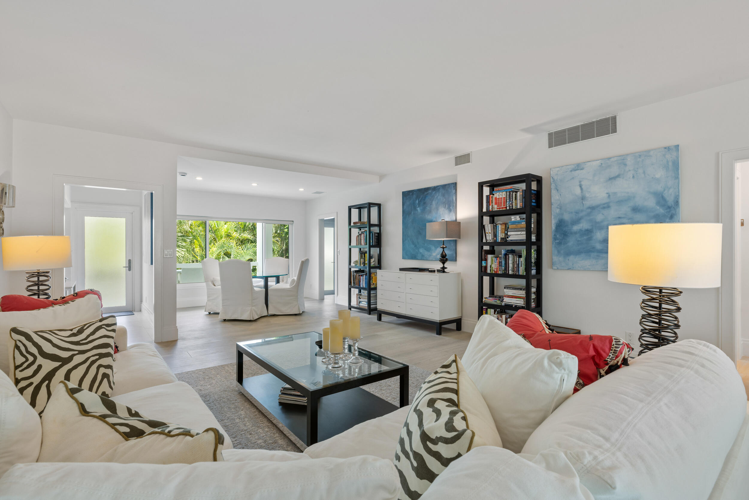 300 South Ocean Boulevard, Unit 3G Palm Beach, FL 33480 - Photo 5 of 25 a living room with furniture and a flat screen tv