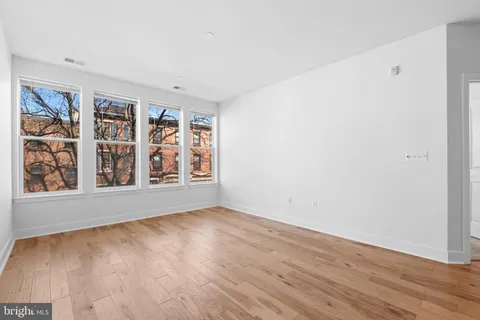 an empty room with window