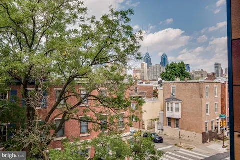 a view of a city with tall buildings