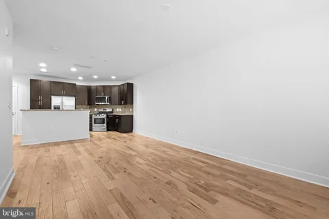 a view of kitchen with wooden floor