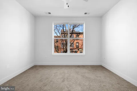 a view of a room with racks on the wall