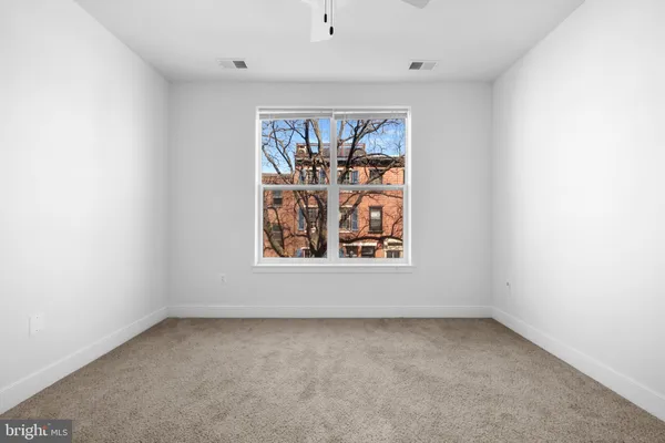 a view of a room with racks on the wall