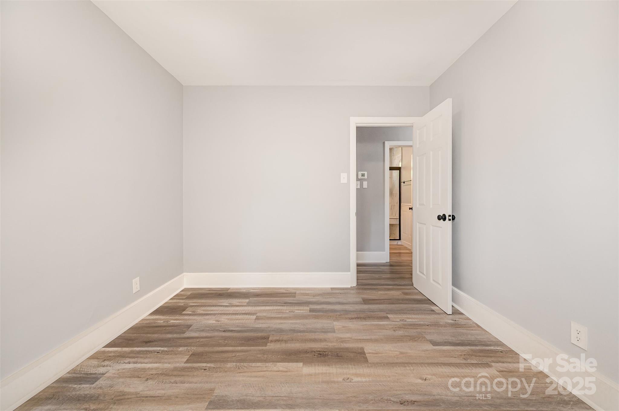 1015 Andover Road Charlotte, NC 28211 - Photo 15 of 22 a view of a room with wooden floor