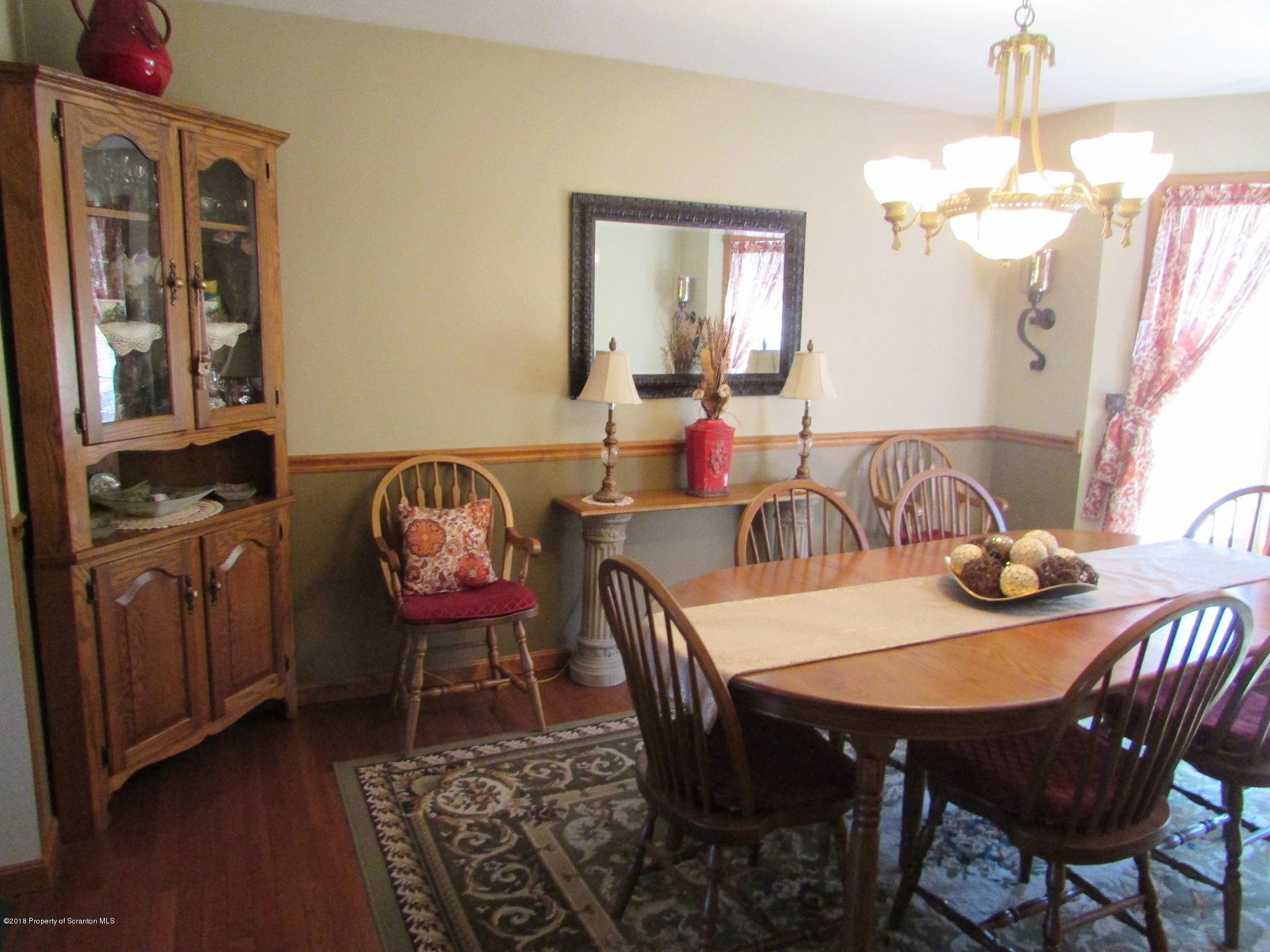8840 State Rte 3001 Meshoppen, PA 18630 - Photo 17 of 64 a view of a dining room with furniture and wooden floor