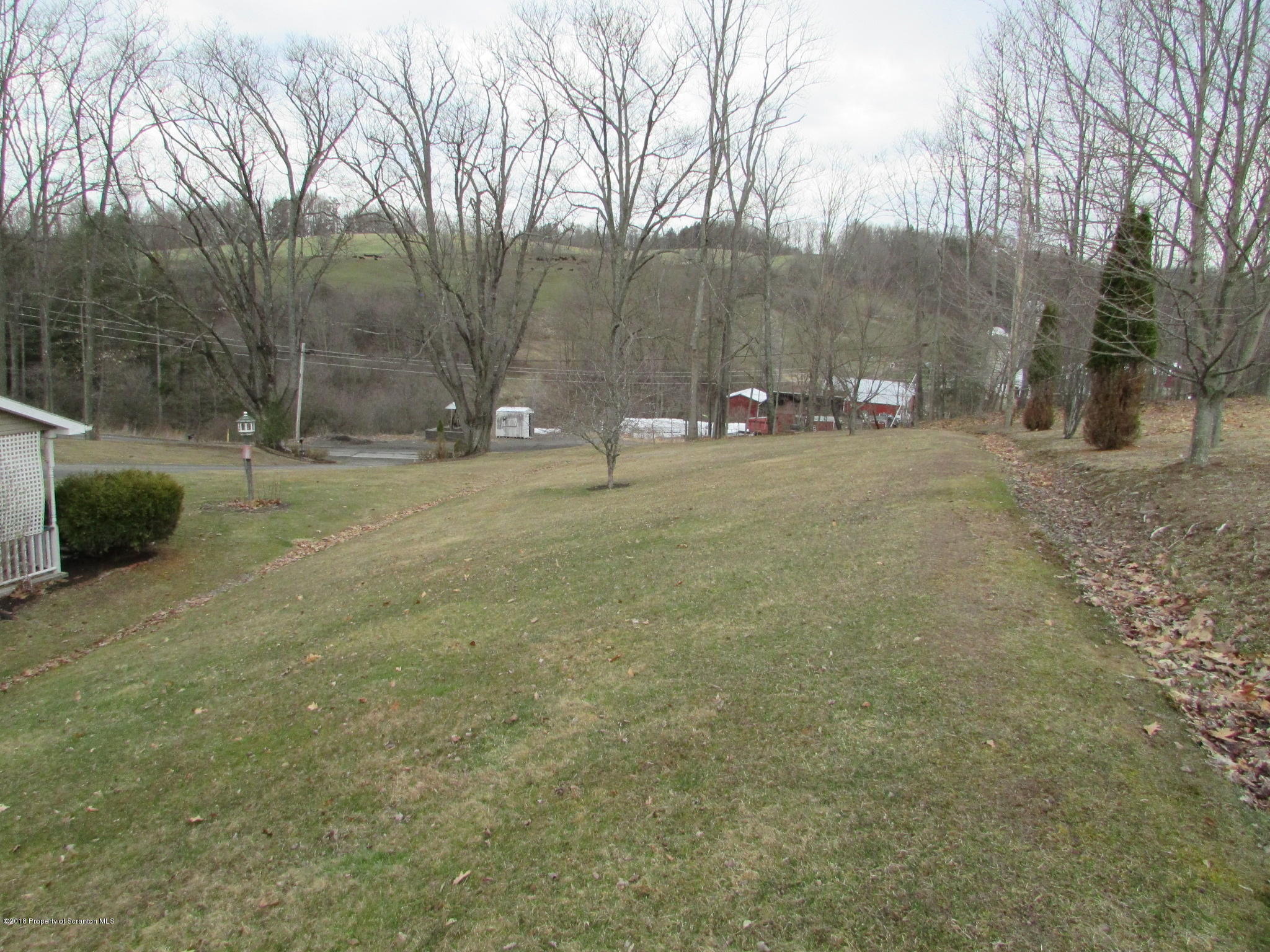 8840 State Rte 3001 Meshoppen, PA 18630 - Photo 54 of 64 a view of a field with trees in the background