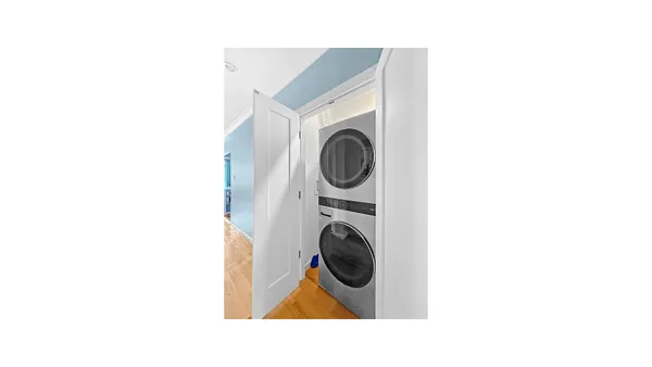 a view of a room with washer and dryer