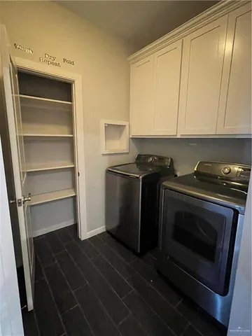 a kitchen with a stove microwave and refrigerator