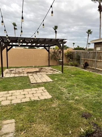 a swimming pool with lawn chairs