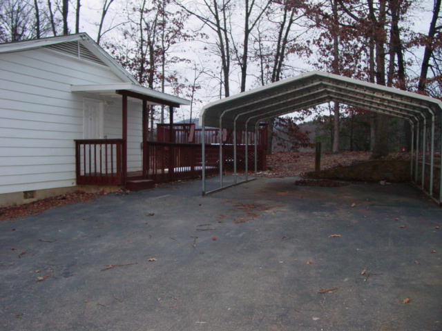 74 Arthur Road Roanoke, VA 24019 - Photo 10 of 11 a view of a house with a yard and wooden deck
