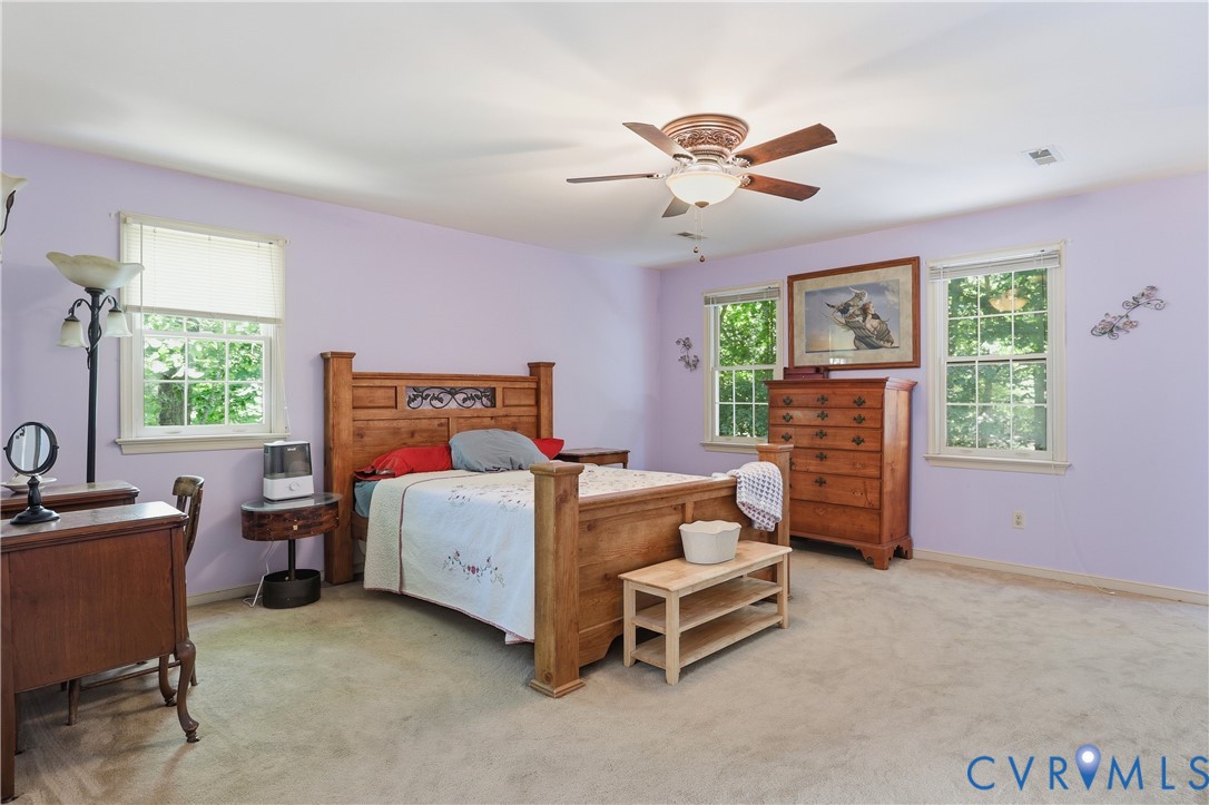 12512 2nd Branch Road Chesterfield, VA 23838 - Photo 25 of 56 a bedroom with a bed and a window