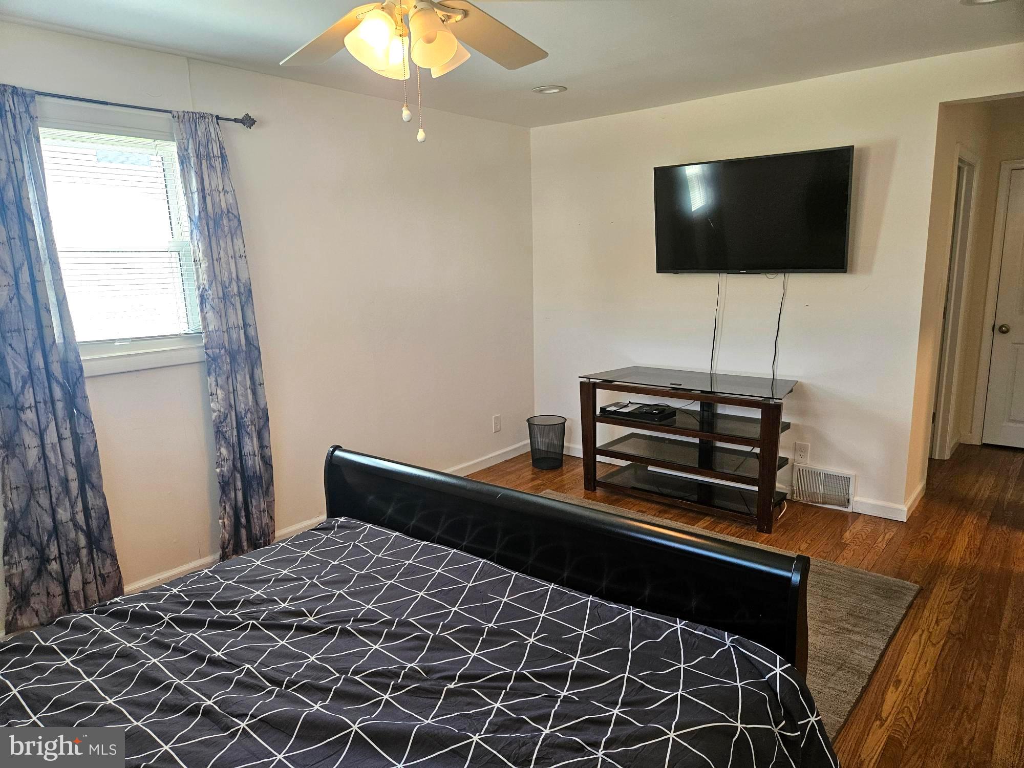 356 West Signal Hill Road King of Prussia, PA 19406 - Photo 13 of 28 a bedroom with a bed and a flat screen tv
