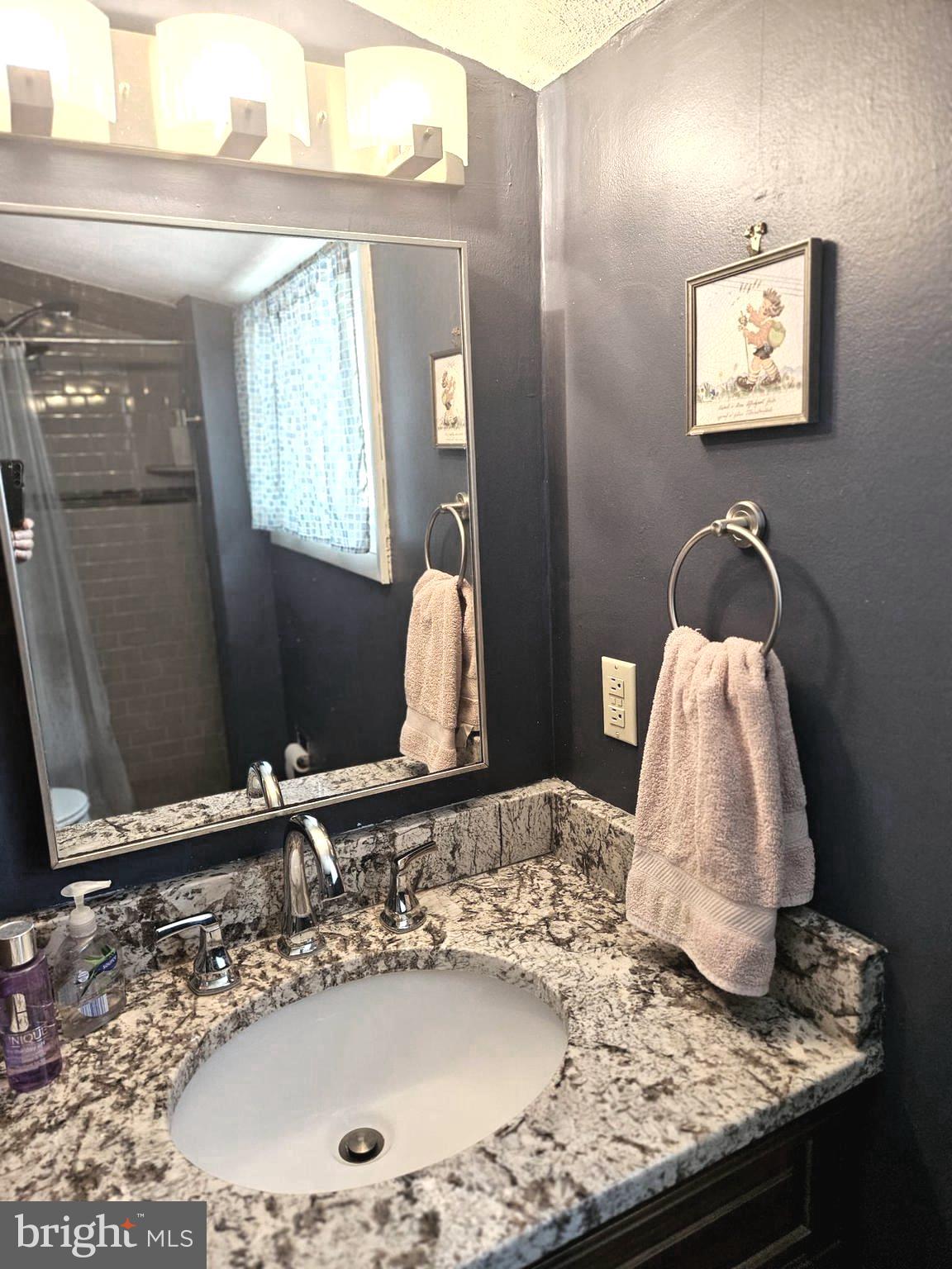 356 West Signal Hill Road King of Prussia, PA 19406 - Photo 18 of 28 a bathroom with a granite countertop sink and a mirror