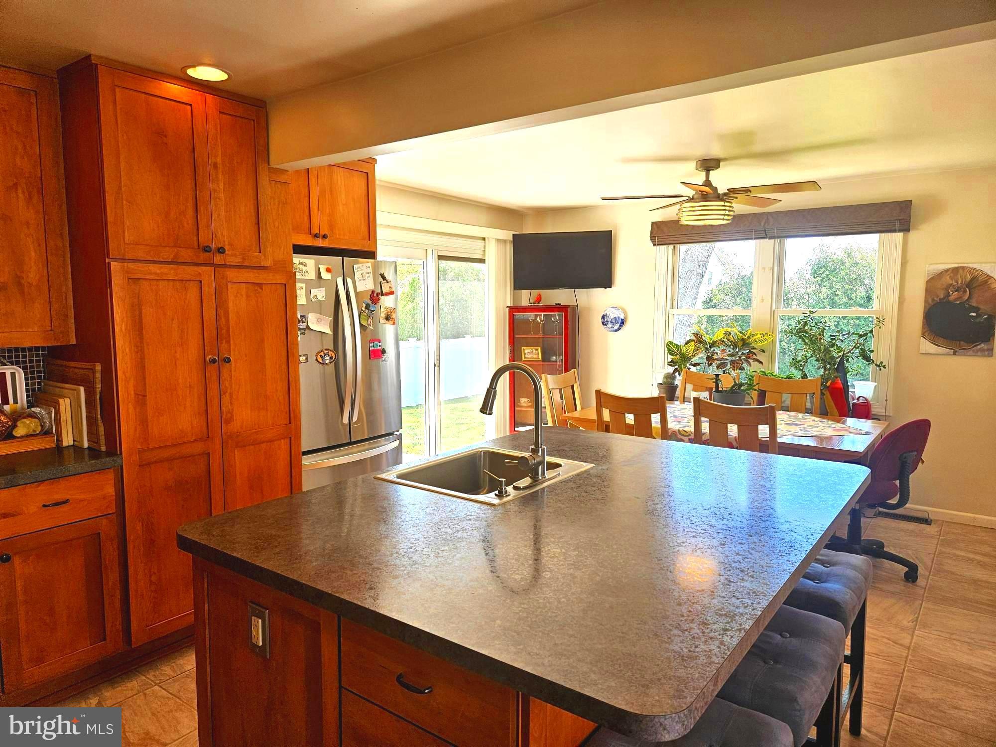 356 West Signal Hill Road King of Prussia, PA 19406 - Photo 9 of 28 a view of a kitchen counter top space with furniture and floor to ceiling window