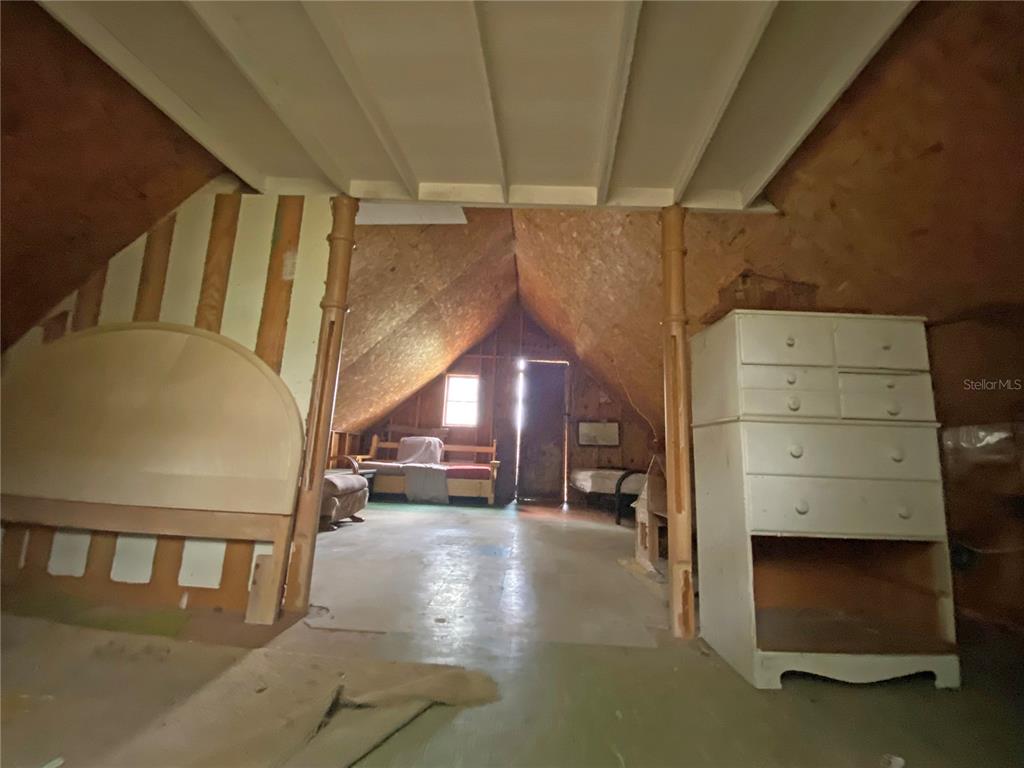 119 Twin Lakes Road Hawthorne, FL 32640 - Photo 32 of 66 a view of a hallway with stairs