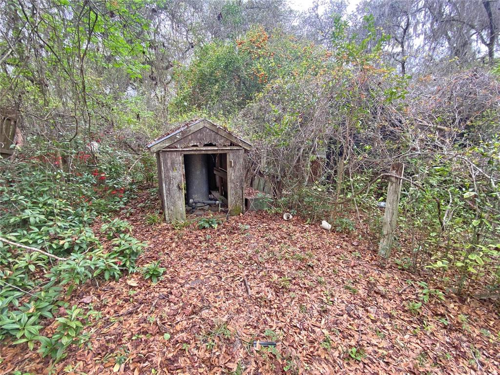 119 Twin Lakes Road Hawthorne, FL 32640 - Photo 38 of 66 a front view of a house with a yard