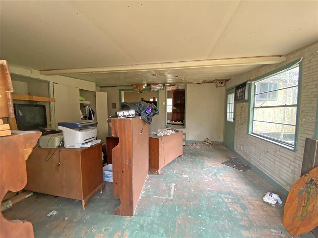 119 Twin Lakes Road Hawthorne, FL 32640 - Photo 46 of 66 a view of a room with workspace and windows