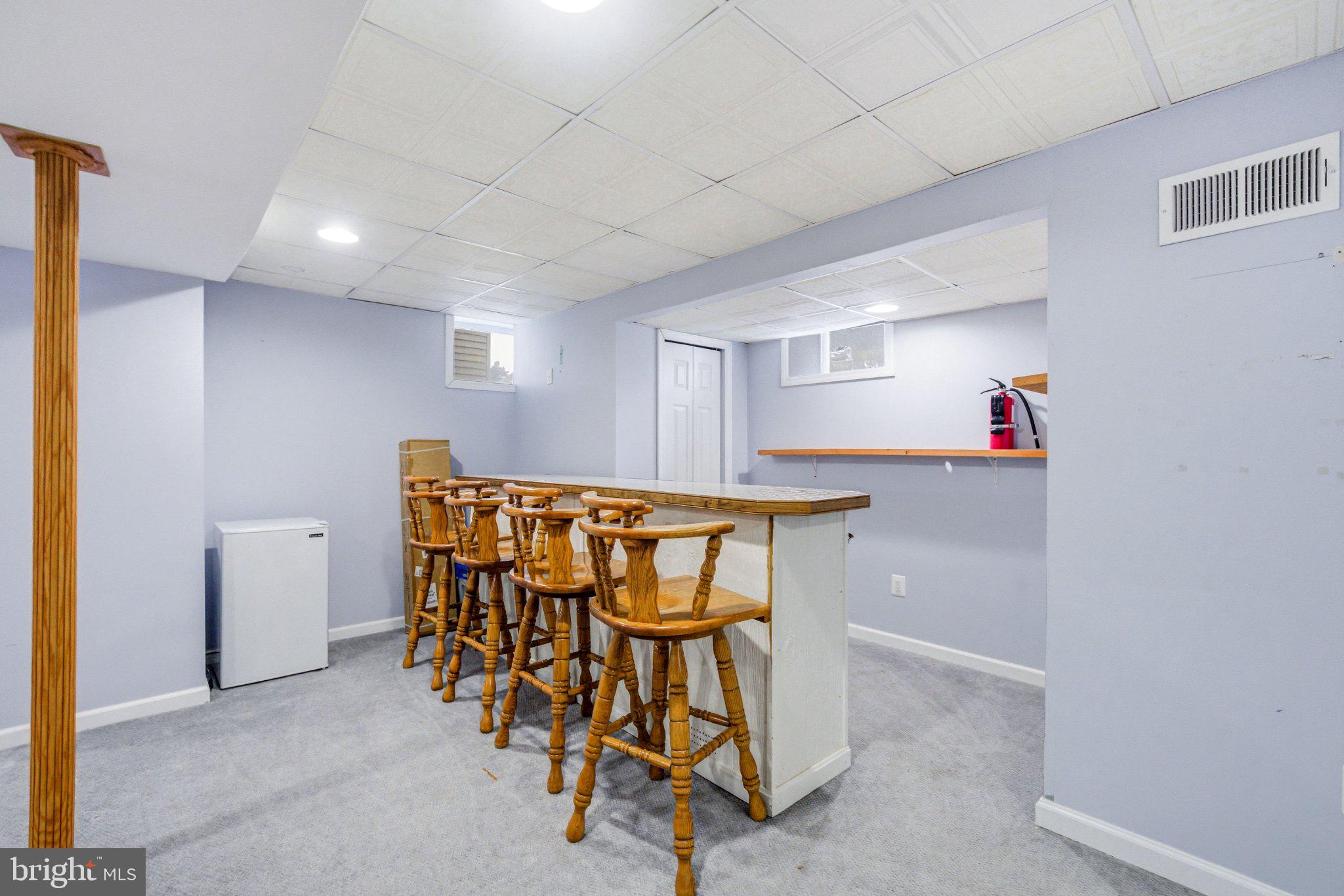 706 Main Street Riverton, NJ 08077 - Photo 36 of 44 Spacious basement with bar seating.