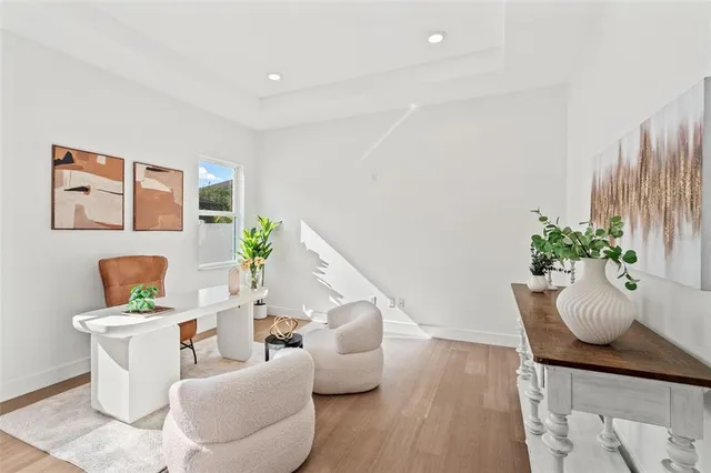 a kitchen with a sink a stove a refrigerator and a window