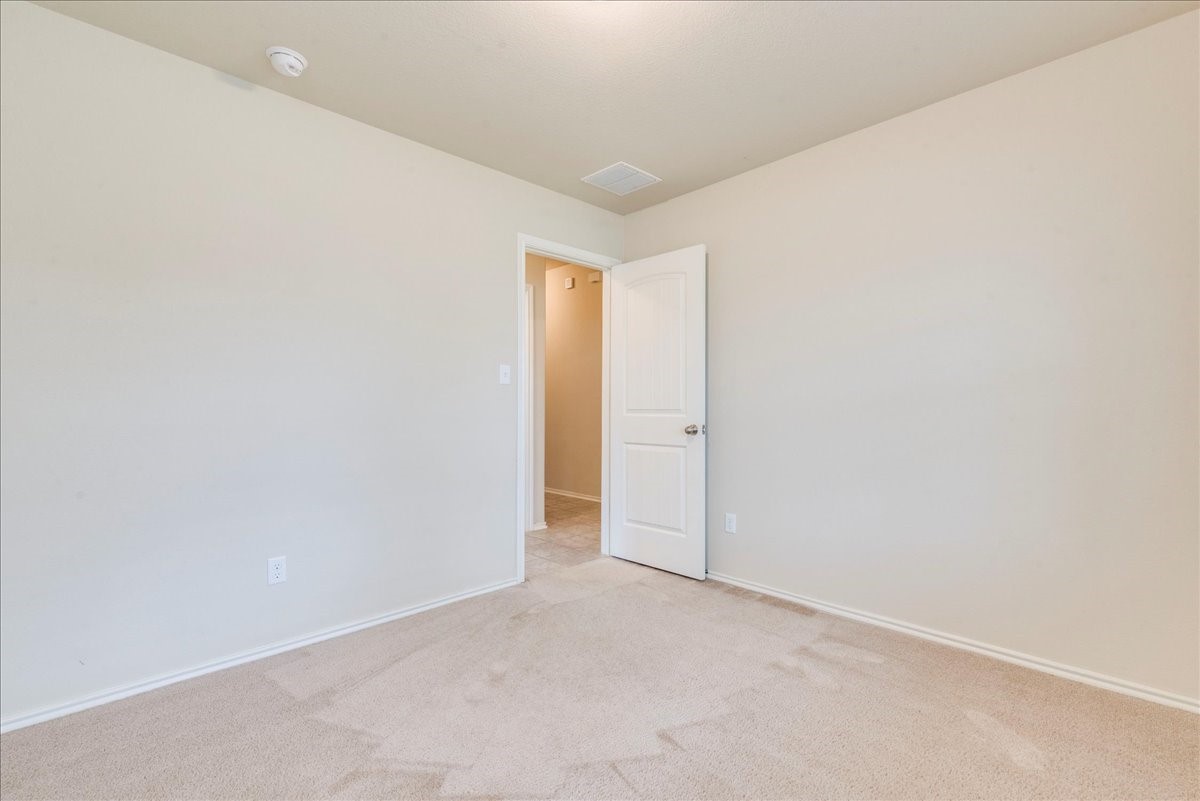 1061 Violet Lane Kyle, TX 78640 - Photo 16 of 34 additional view of secondary bedroom