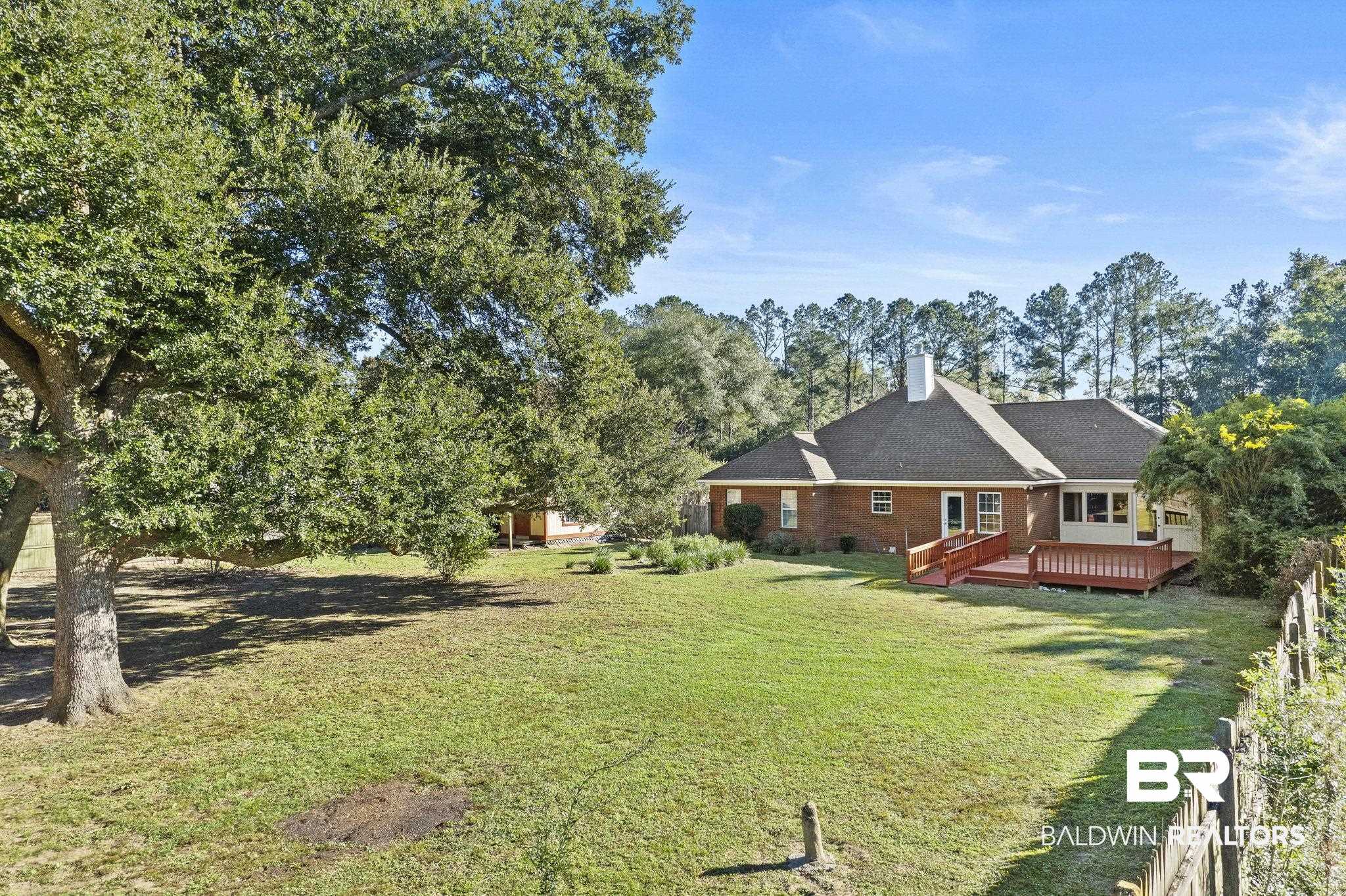 9631 Bay Meadows Avenue Fairhope, AL 36532 - Photo 42 of 49 View of yard featuring a deck