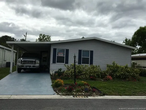 a view of a house with a garden