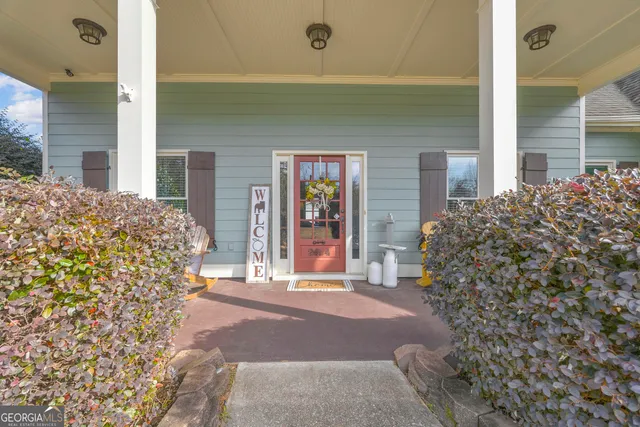 a backyard of a house with seating space