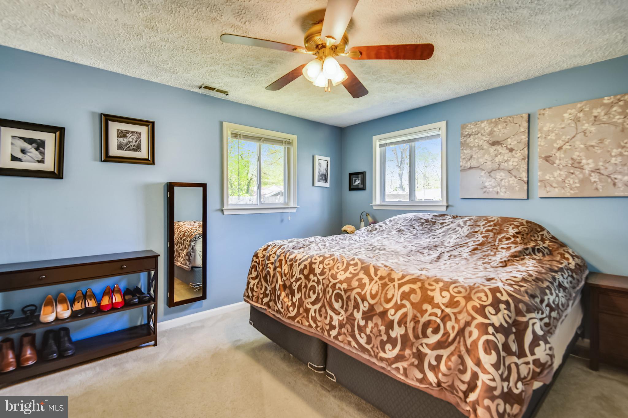552 Sunset Knoll Road Pasadena, MD 21122 - Photo 15 of 36 a bedroom with a bed dresser and window