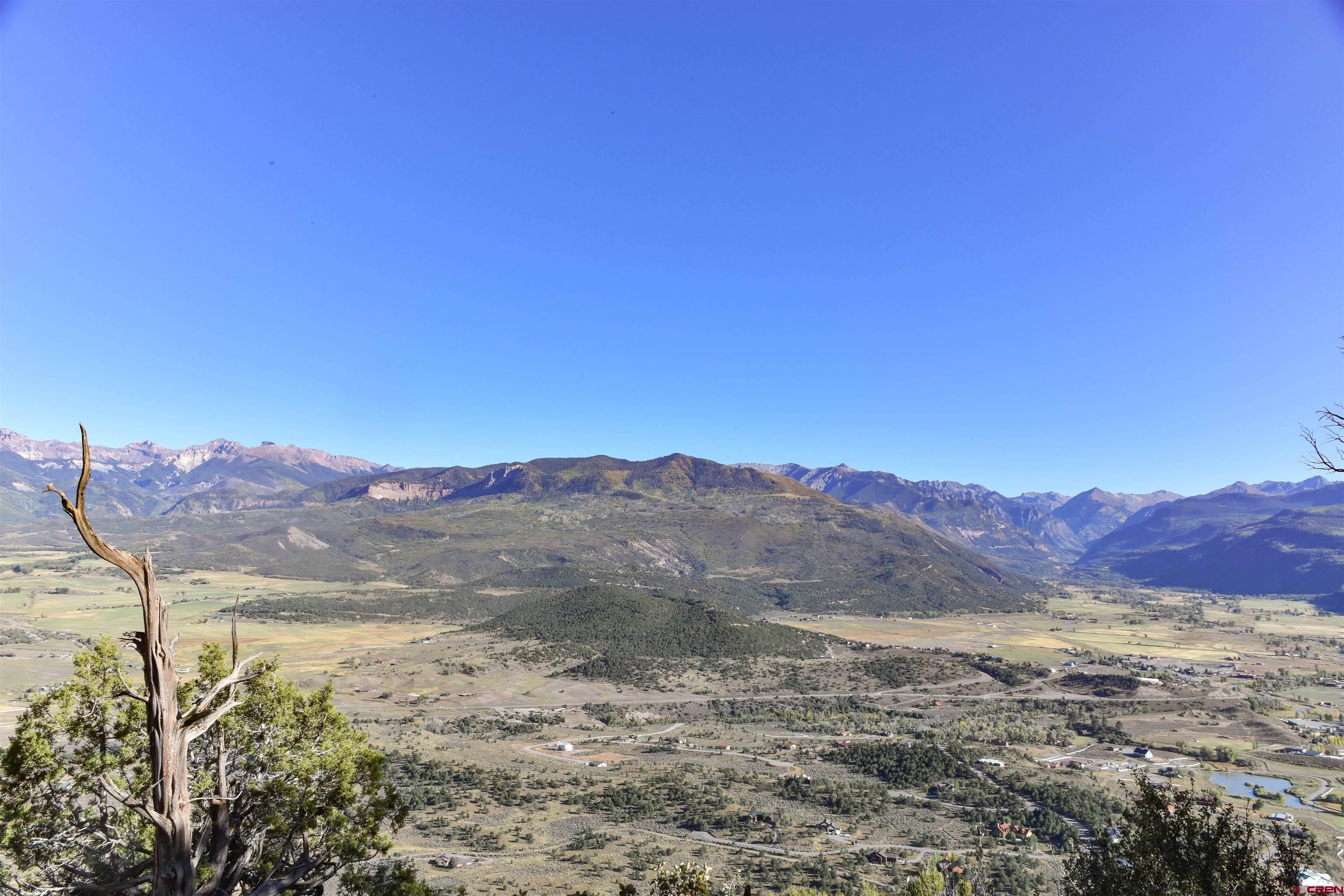 802 H Pine Drive Ridgway, CO 81432 - Photo 18 of 20 a view of a mountain range with a forest