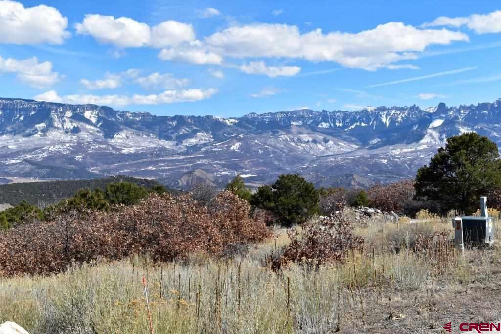 802 H Pine Drive Ridgway, CO 81432 - Photo 4 of 20 a view of a lake with mountains in the background