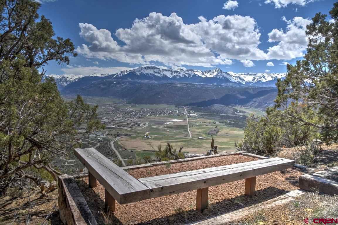 802 H Pine Drive Ridgway, CO 81432 - Photo 10 of 20 a view of a yard with a bench