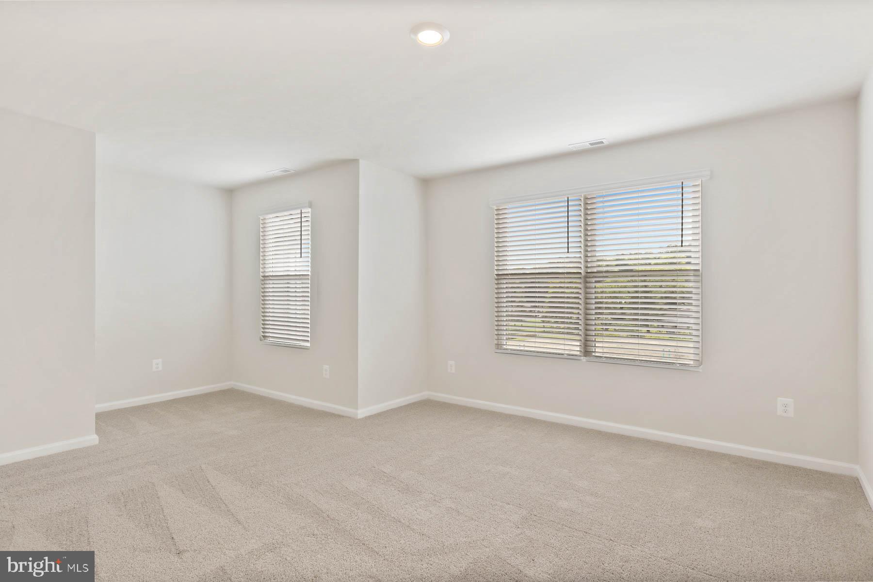 39 Cramsford Street Falling Waters, WV 25419 - Photo 6 of 10 a view of an empty room with a window