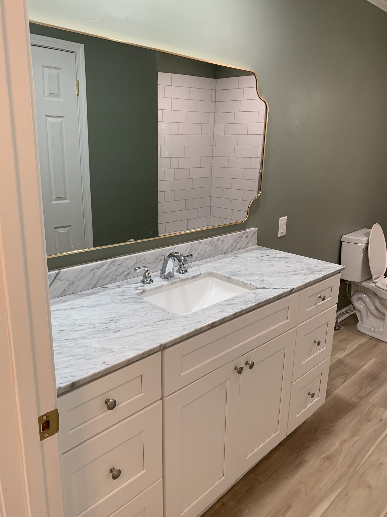 5870 Chestnut Bluff Road Friendship, TN 38034 - Photo 14 of 19 a bathroom with a granite countertop sink and white cabinets