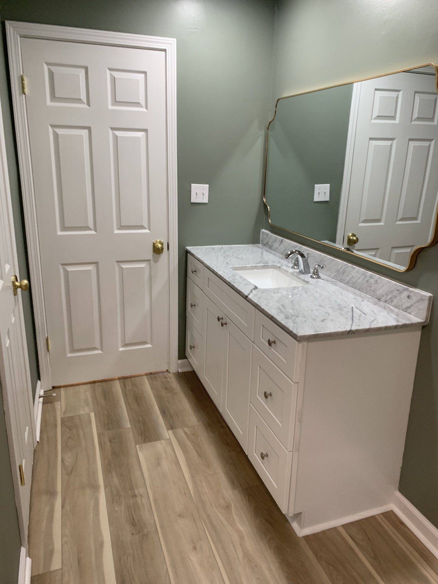 5870 Chestnut Bluff Road Friendship, TN 38034 - Photo 17 of 19 a bathroom with a sink and a mirror