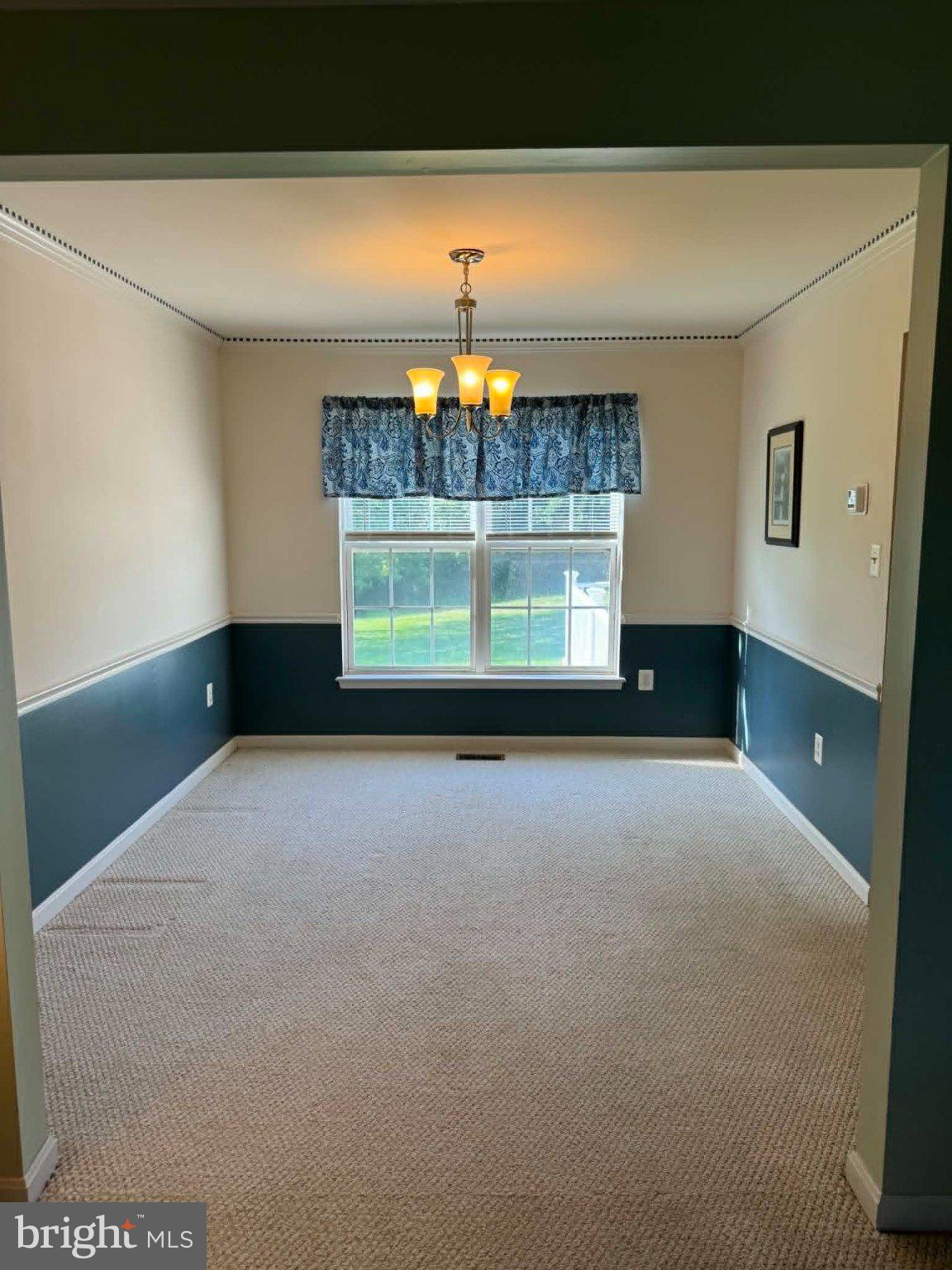 3826 Roundtree Road Jefferson, MD 21755 - Photo 9 of 19 a view of an empty room with a window