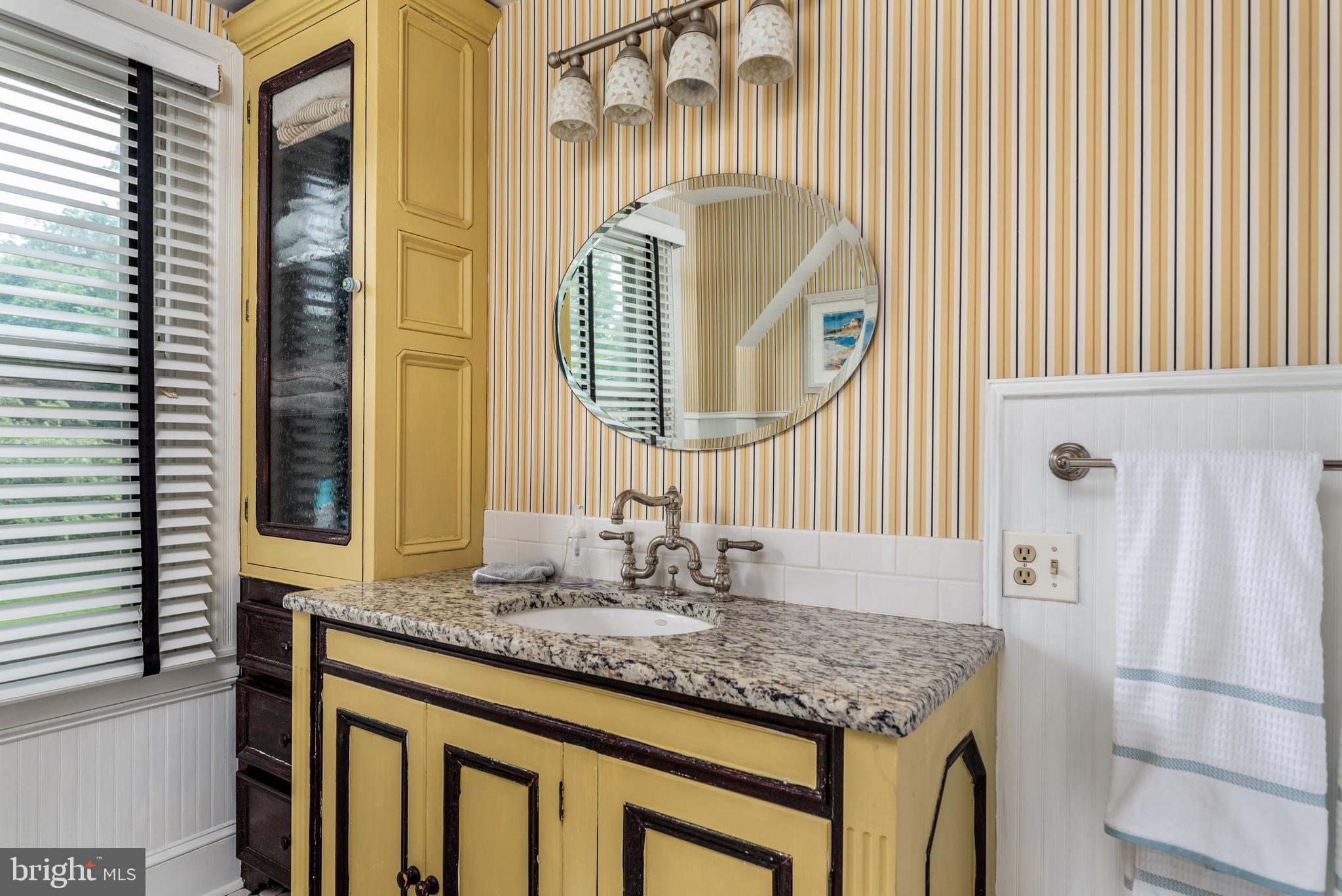 938 Summit Road Narberth, PA 19072 - Photo 31 of 60 Hall Bath with Vanity and Built-in Cabinet
