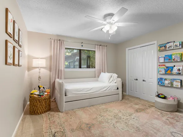 a room with toys and a wooden floor