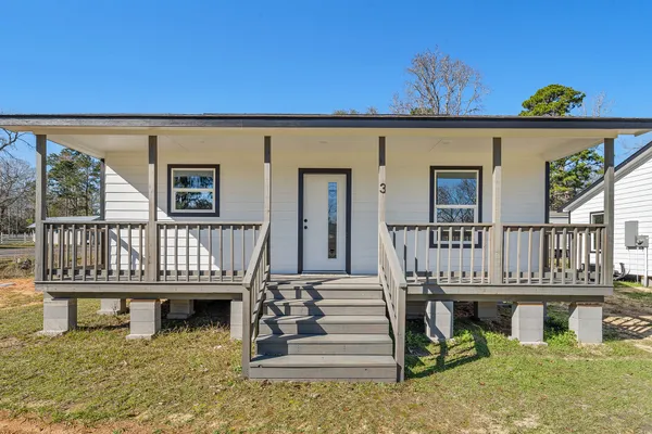 front view of a house with a balcony