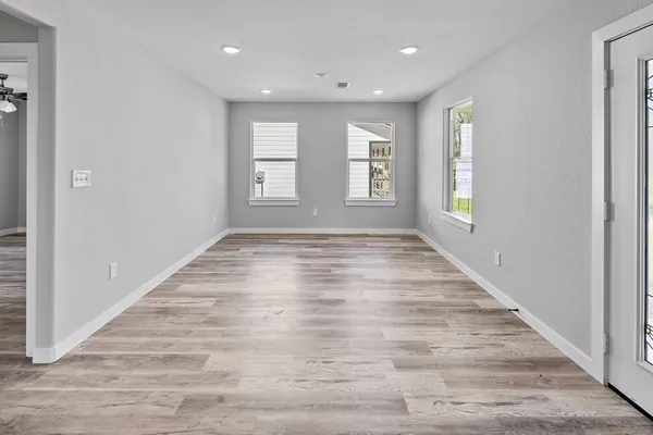 a view of an empty room and window