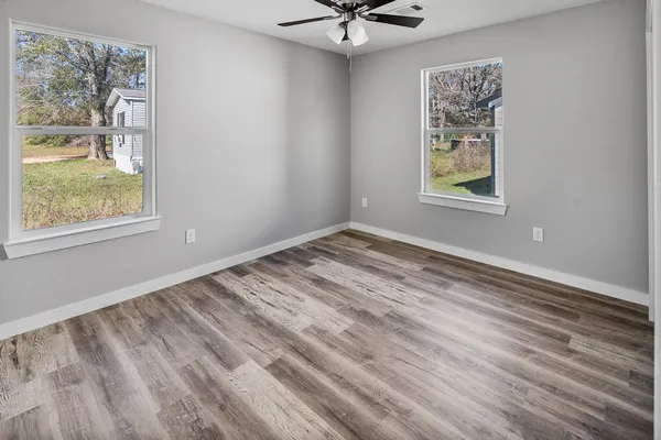 a view of an empty room and window