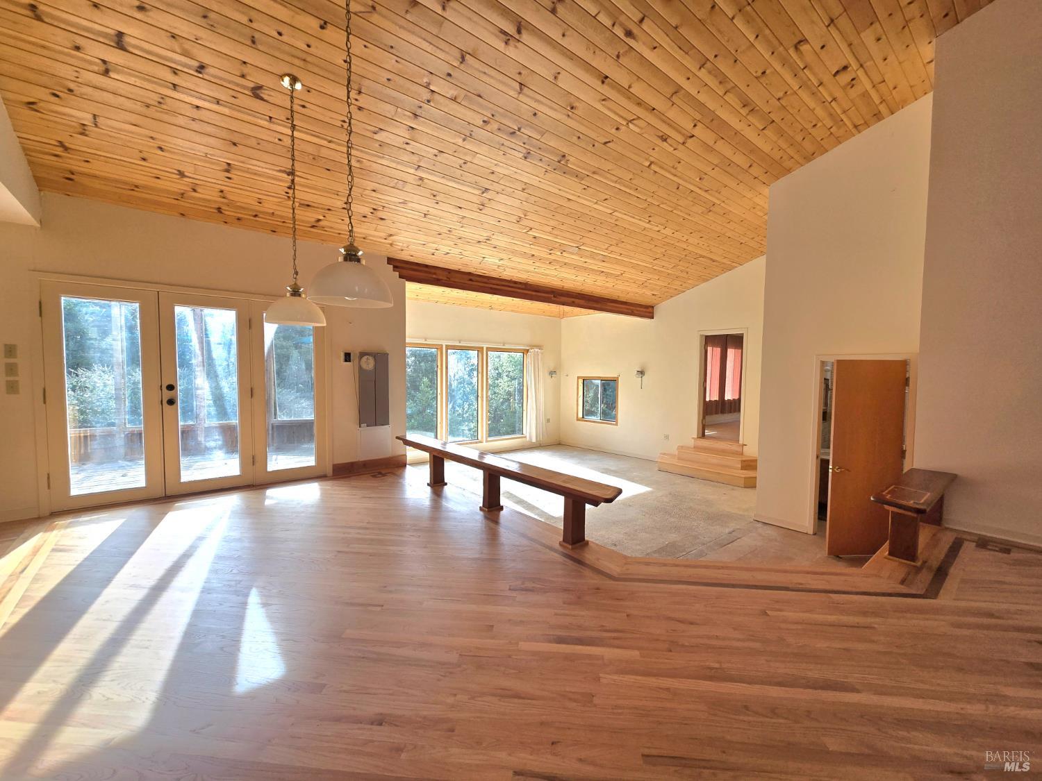 36955 Eureka Stagecoach Road Willits, CA 95490 - Photo 10 of 46 a living room with furniture and a floor to ceiling window